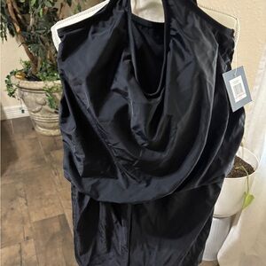 Swimwear complete one piece with shorts loose fitting very flattering